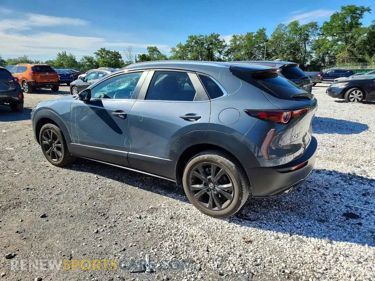 2 Photograph of a damaged car 3MVDMBCM9PM571685 MAZDA CX30 2023