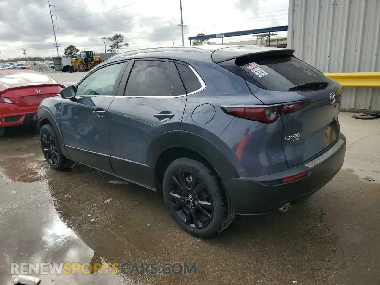 2 Photograph of a damaged car 3MVDMBCM9PM573338 MAZDA CX30 2023