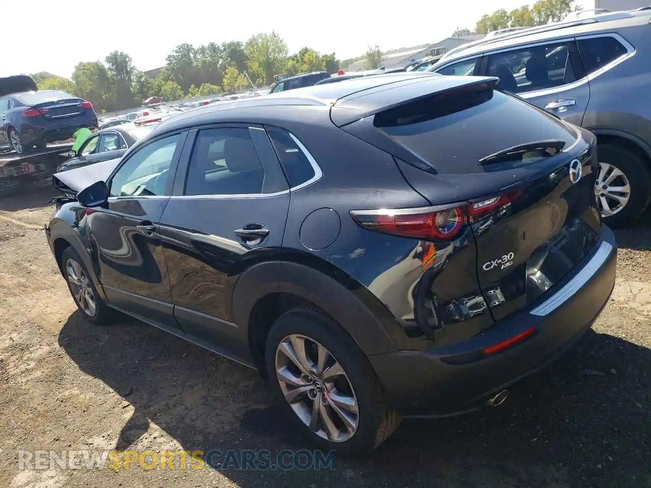 2 fotografías del automóvil dañado 3MVDMBCMXPM503489 MAZDA CX30 2023