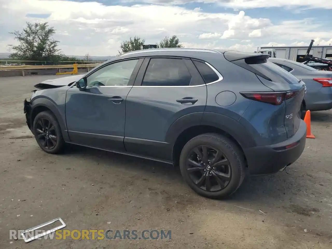 2 Photograph of a damaged car 3MVDMBCMXPM560842 MAZDA CX30 2023