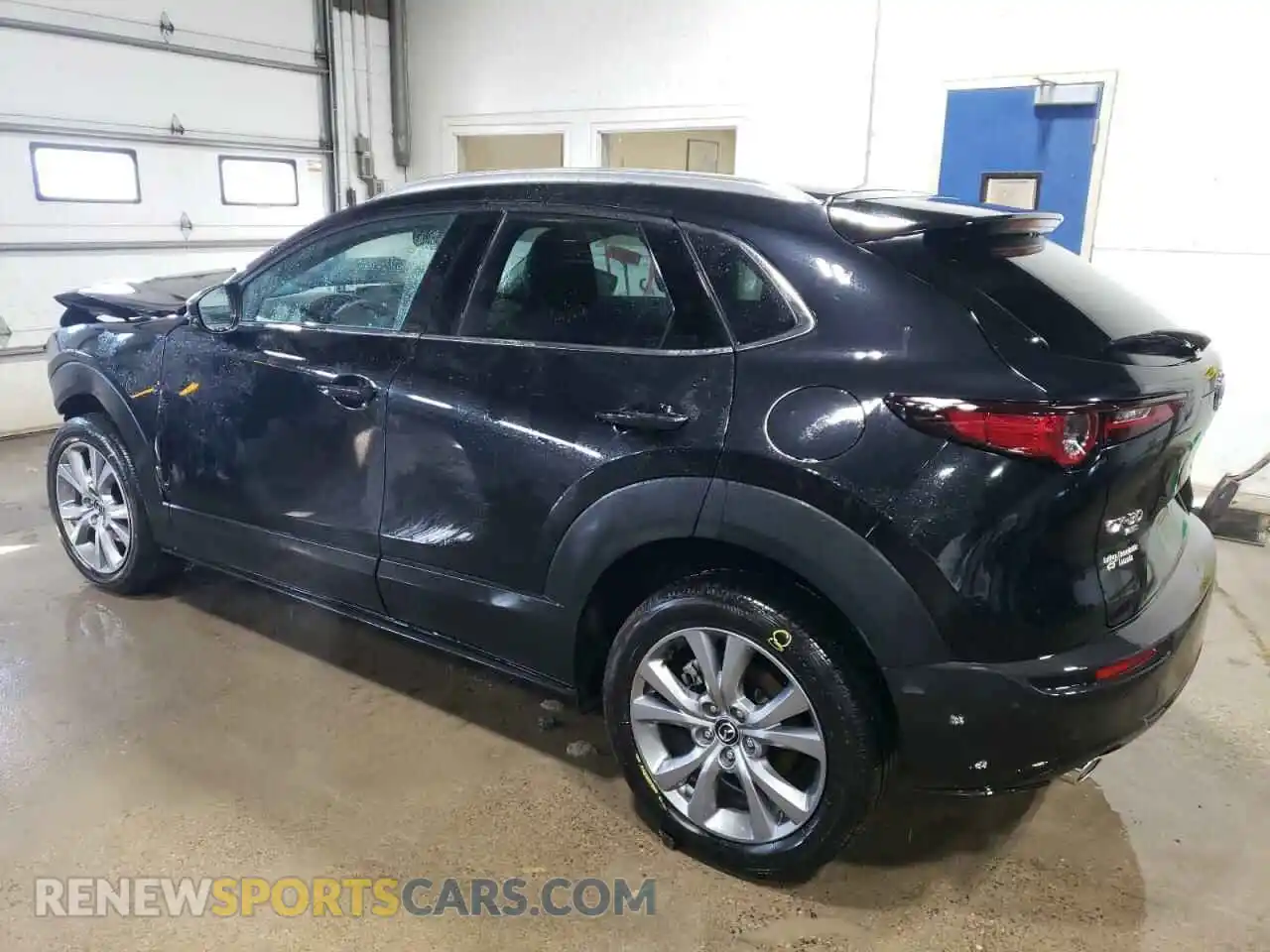 2 Photograph of a damaged car 3MVDMBDM0PM520591 MAZDA CX30 2023