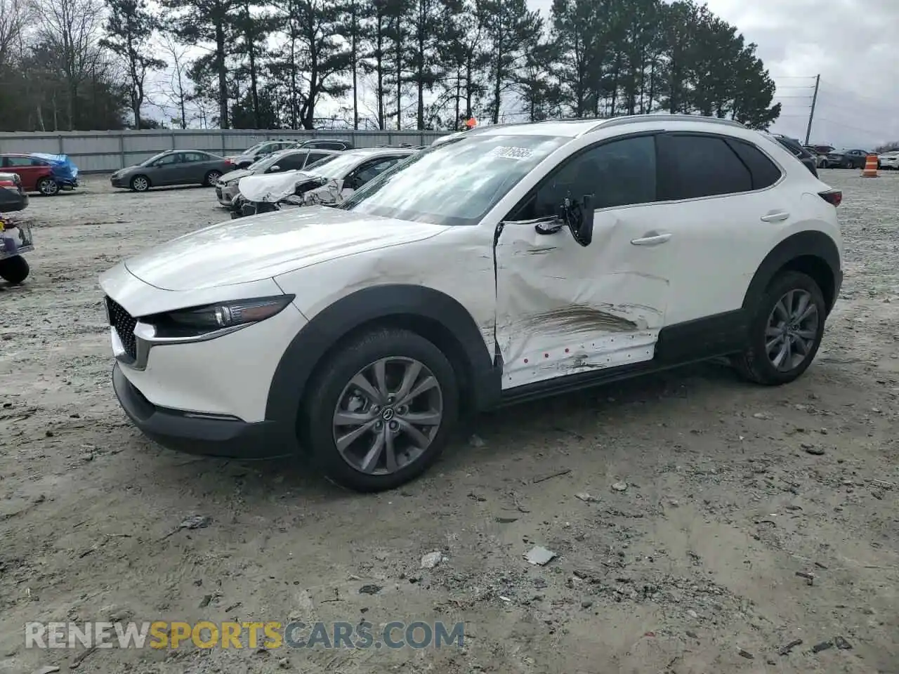 1 Photograph of a damaged car 3MVDMBDM0PM589412 MAZDA CX30 2023