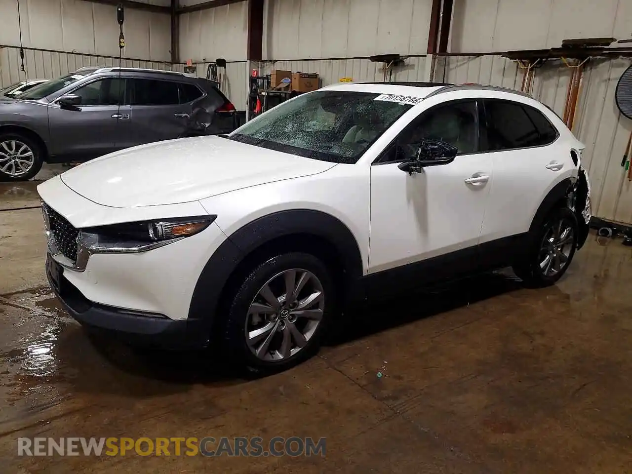 1 Photograph of a damaged car 3MVDMBDM2PM557495 MAZDA CX30 2023