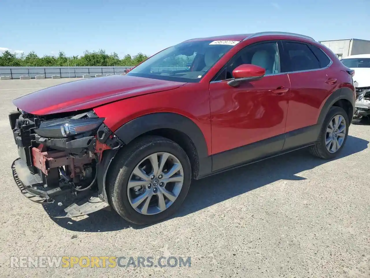 1 Photograph of a damaged car 3MVDMBDM8PM569781 MAZDA CX30 2023