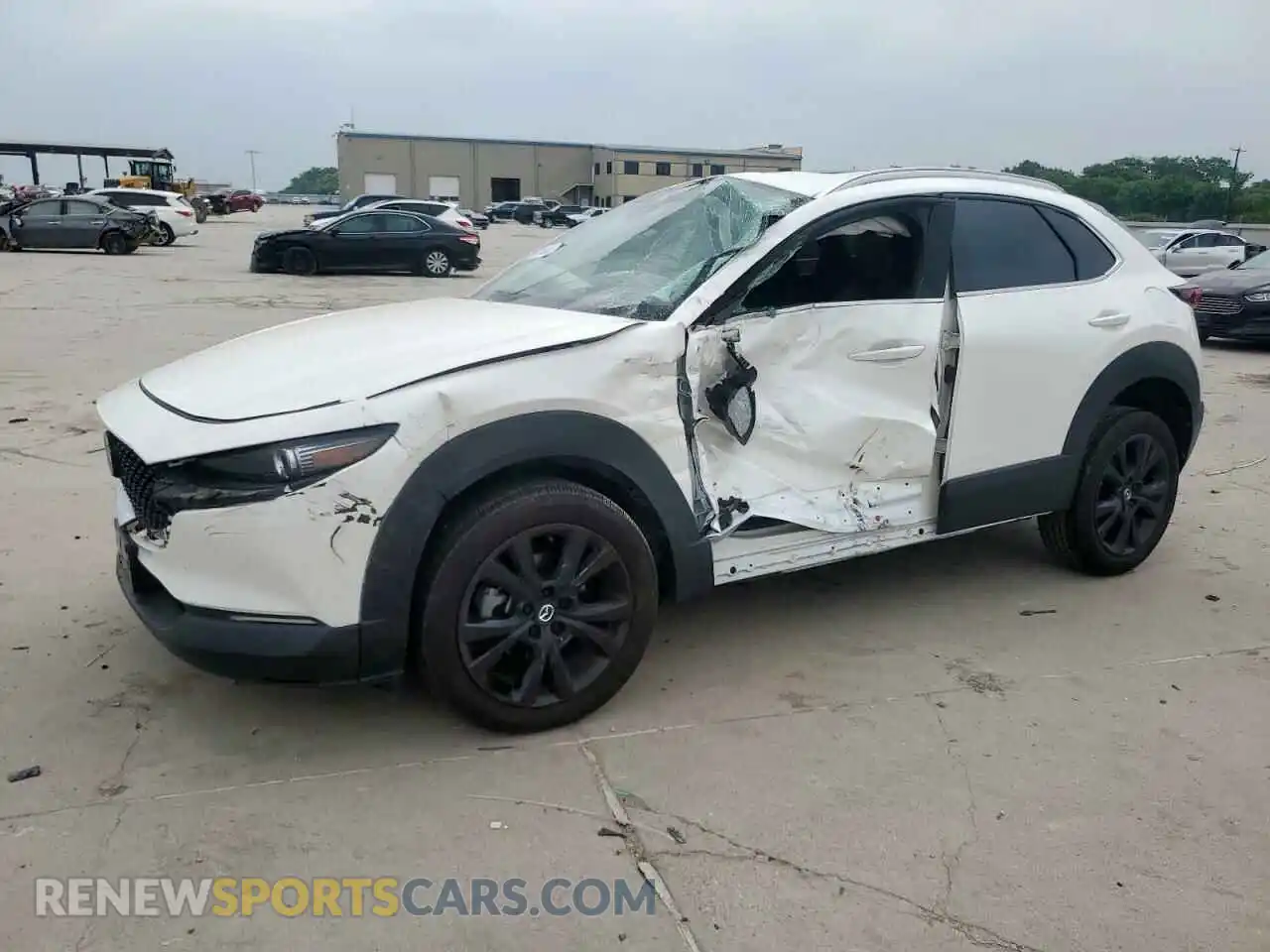 1 Photograph of a damaged car 3MVDMBDY4PM542533 MAZDA CX30 2023