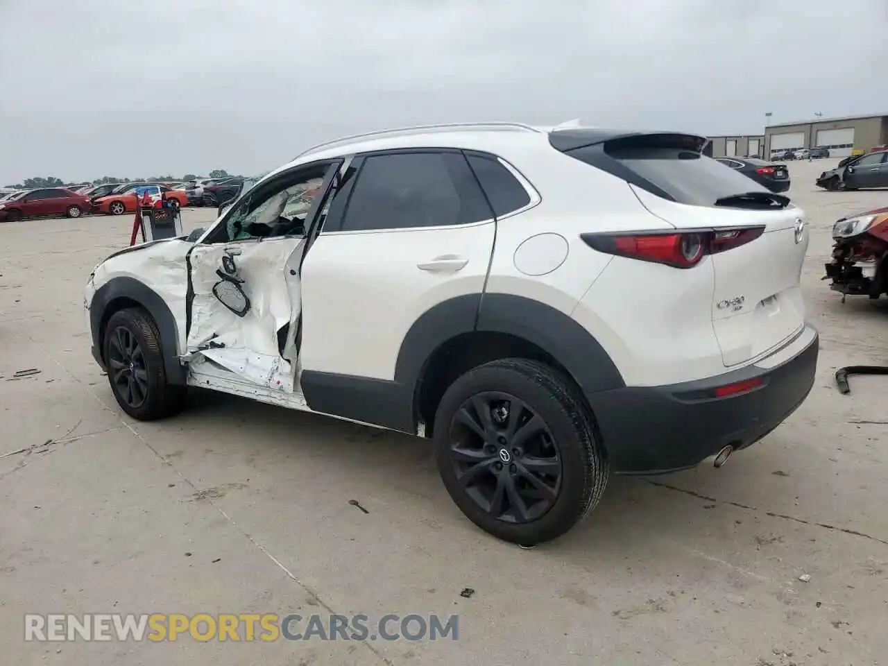 2 Photograph of a damaged car 3MVDMBDY4PM542533 MAZDA CX30 2023