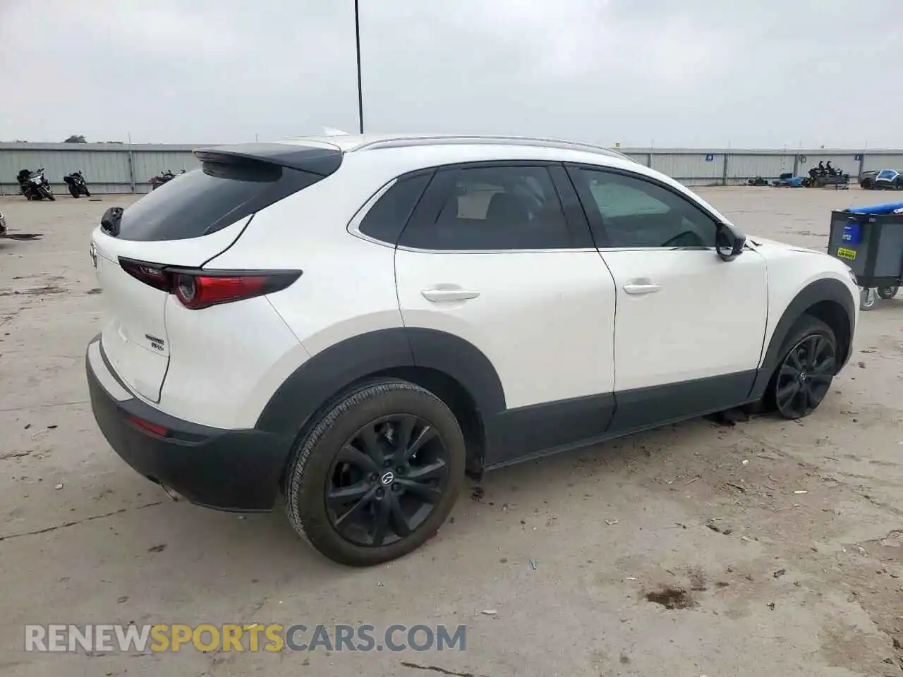 3 Photograph of a damaged car 3MVDMBDY4PM542533 MAZDA CX30 2023