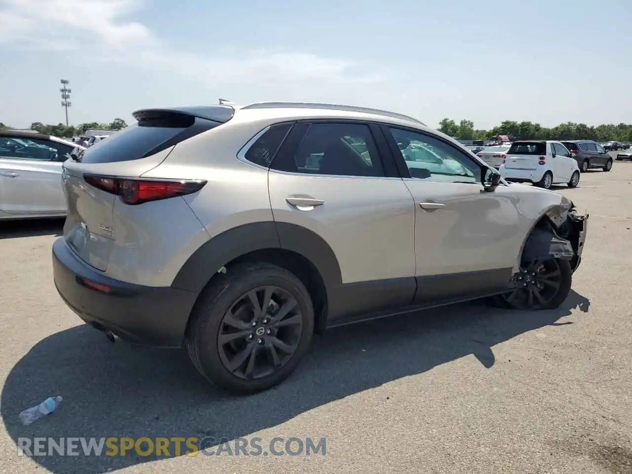 3 Photograph of a damaged car 3MVDMBDY9PM519393 MAZDA CX30 2023