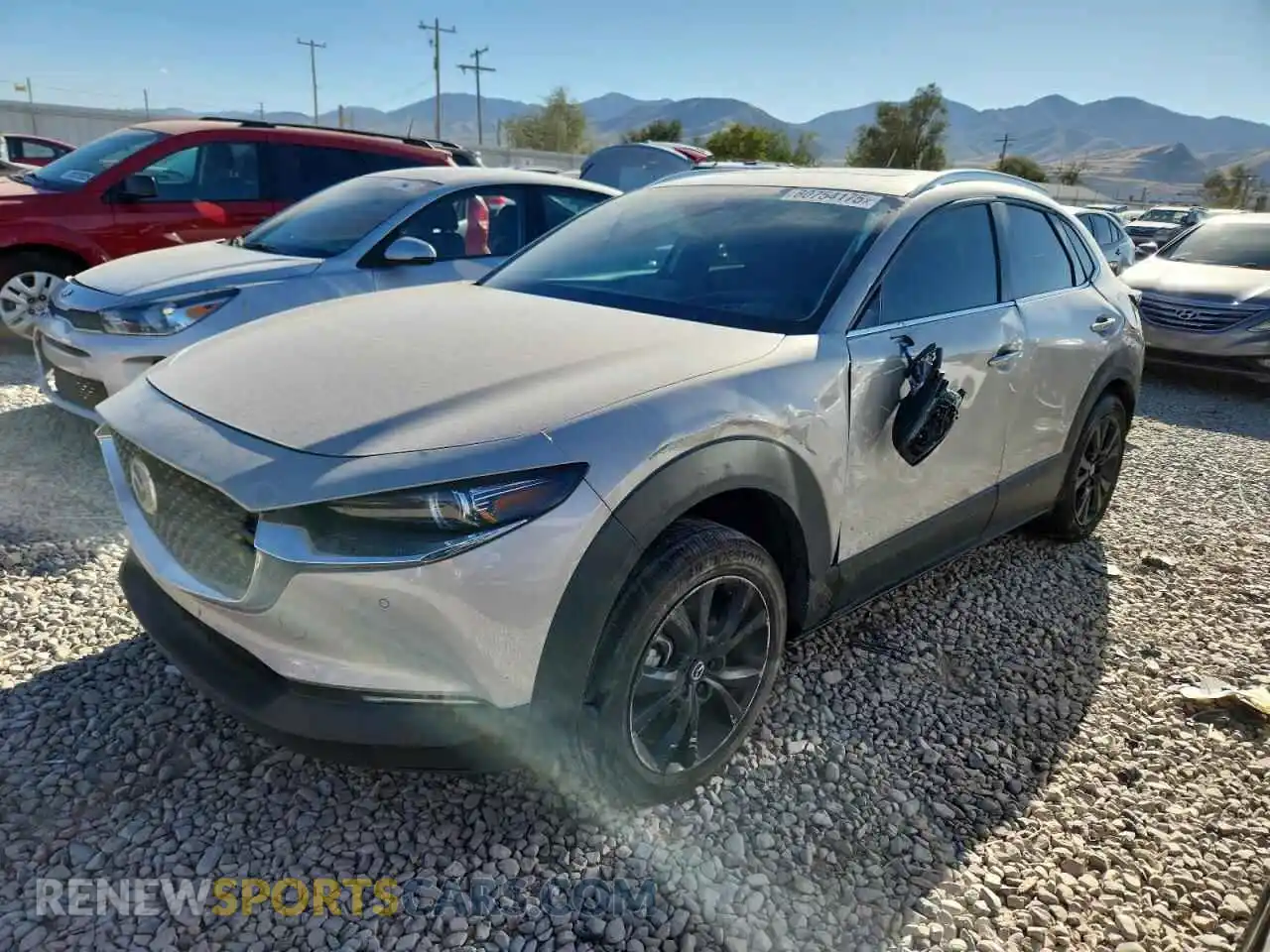 1 Photograph of a damaged car 3MVDMBEYXPM576393 MAZDA CX30 2023