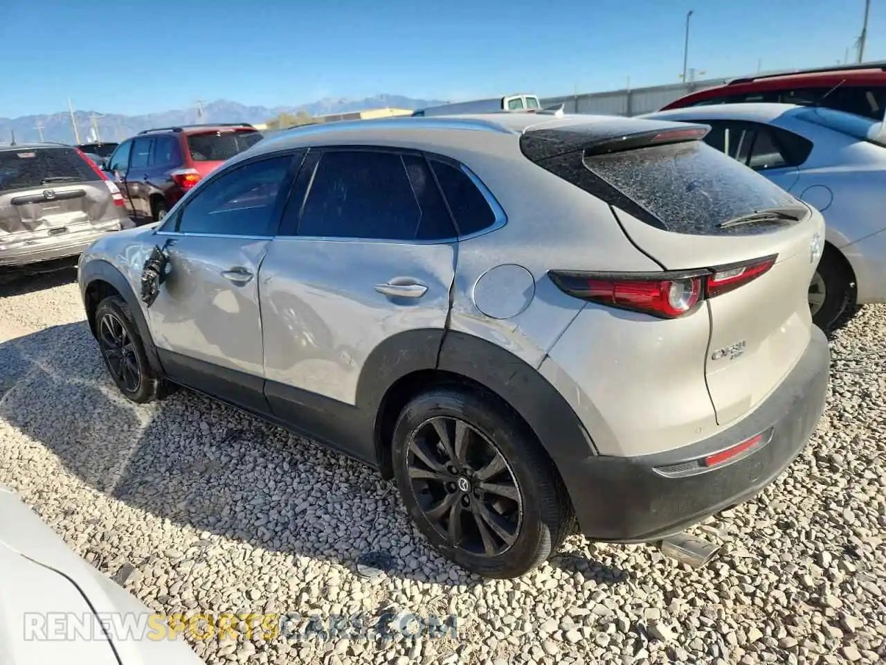 2 Photograph of a damaged car 3MVDMBEYXPM576393 MAZDA CX30 2023