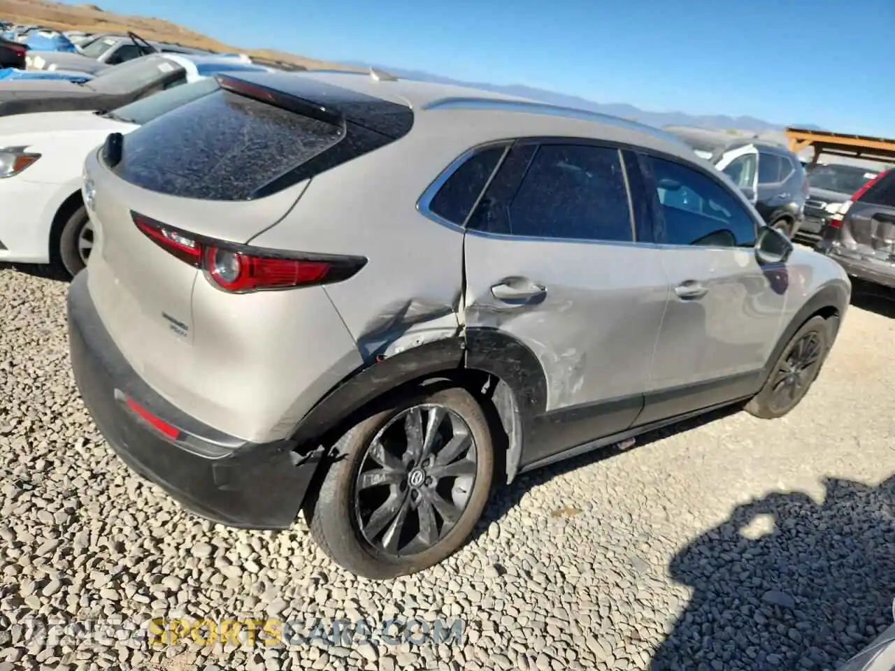 3 Photograph of a damaged car 3MVDMBEYXPM576393 MAZDA CX30 2023
