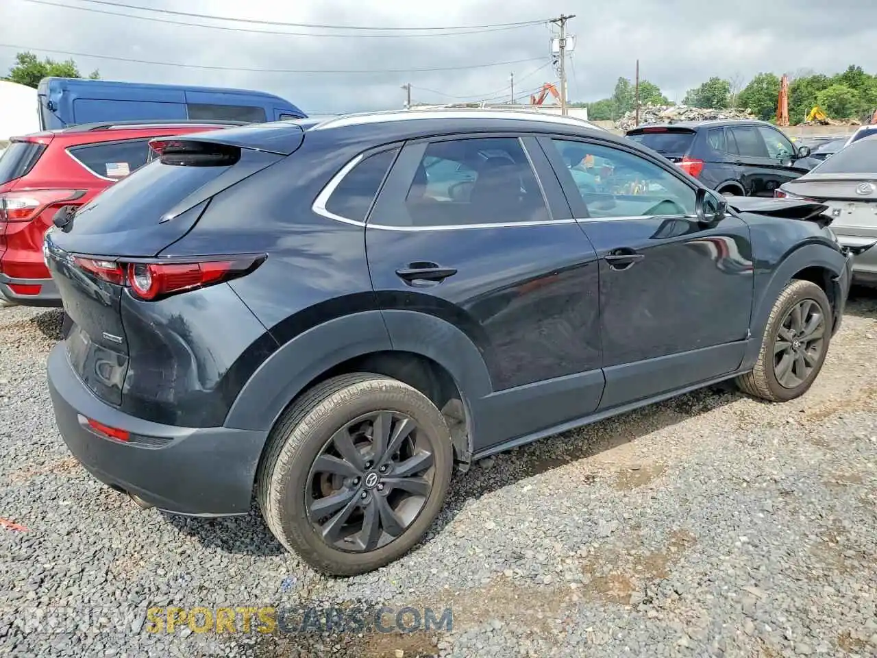 3 Photograph of a damaged car 3MVDMBBM1RM657903 MAZDA CX30 2024