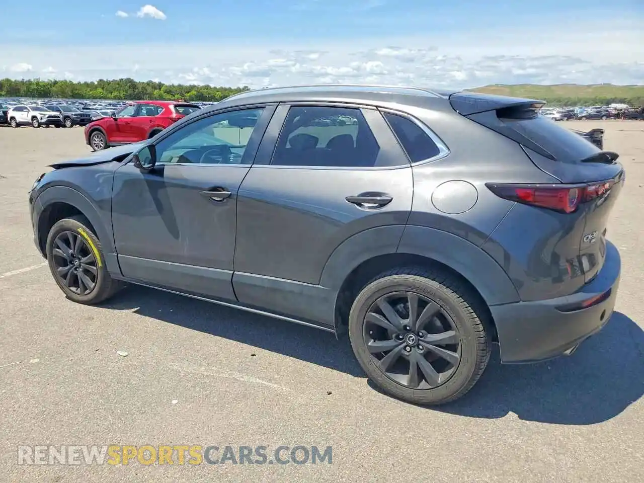 2 fotografías del automóvil dañado 3MVDMBBM2RM638938 MAZDA CX30 2024