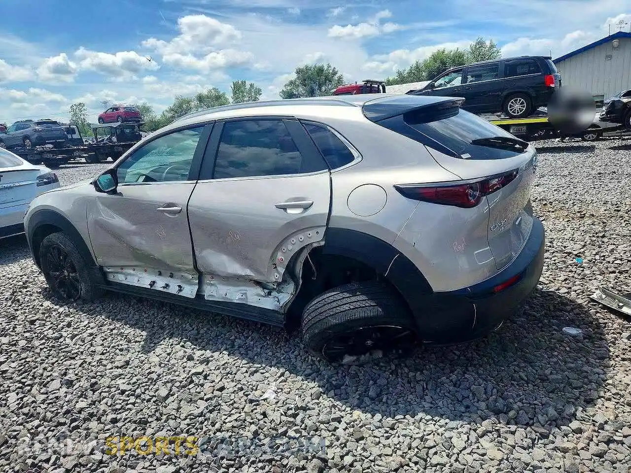 2 Photograph of a damaged car 3MVDMBBM2RM648613 MAZDA CX30 2024