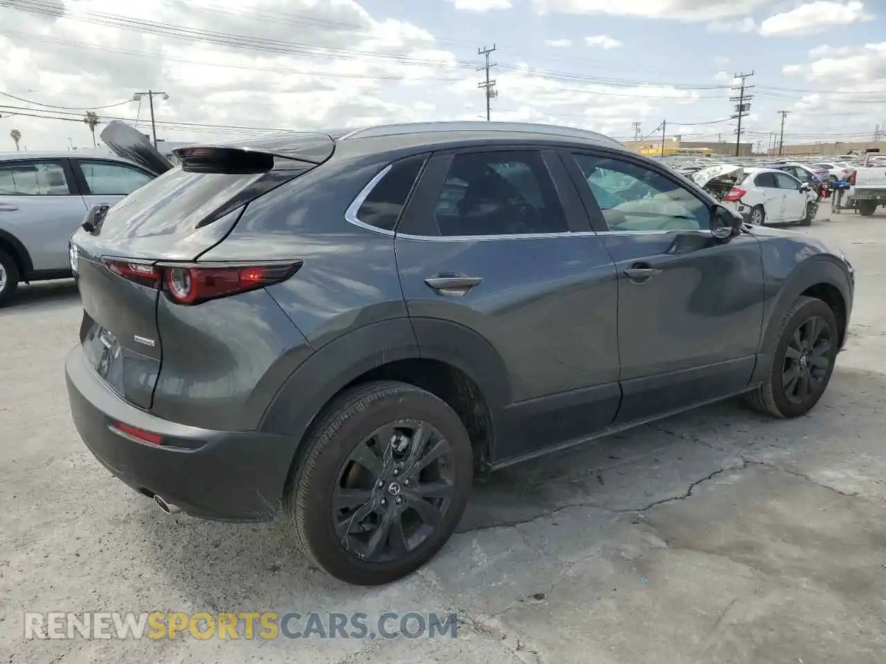 3 Photograph of a damaged car 3MVDMBBM3RM661595 MAZDA CX30 2024