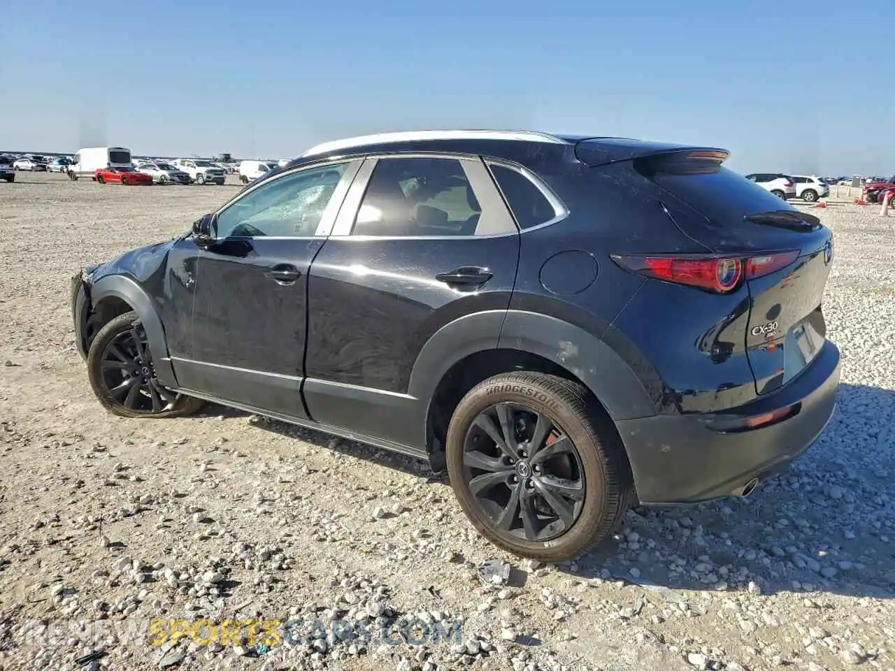 2 Photograph of a damaged car 3MVDMBBM6RM696504 MAZDA CX30 2024