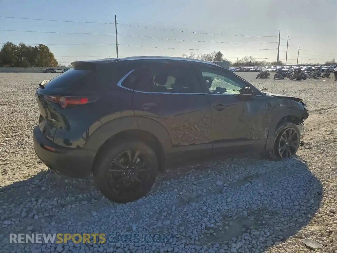 3 Photograph of a damaged car 3MVDMBBM6RM696504 MAZDA CX30 2024