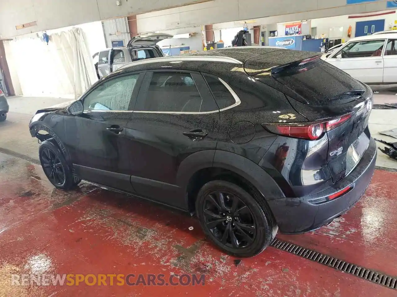 2 Photograph of a damaged car 3MVDMBBM7RM699413 MAZDA CX30 2024