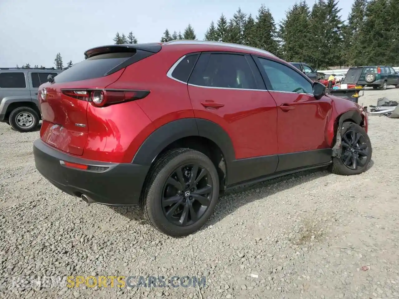 3 Photograph of a damaged car 3MVDMBBM9RM672178 MAZDA CX30 2024