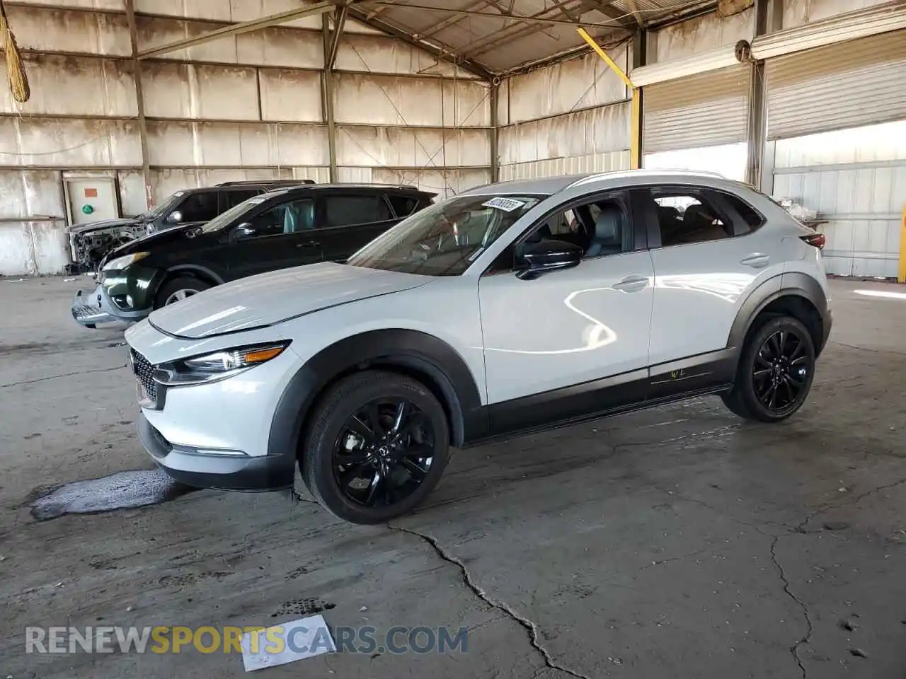 1 Photograph of a damaged car 3MVDMBBM9RM689949 MAZDA CX30 2024