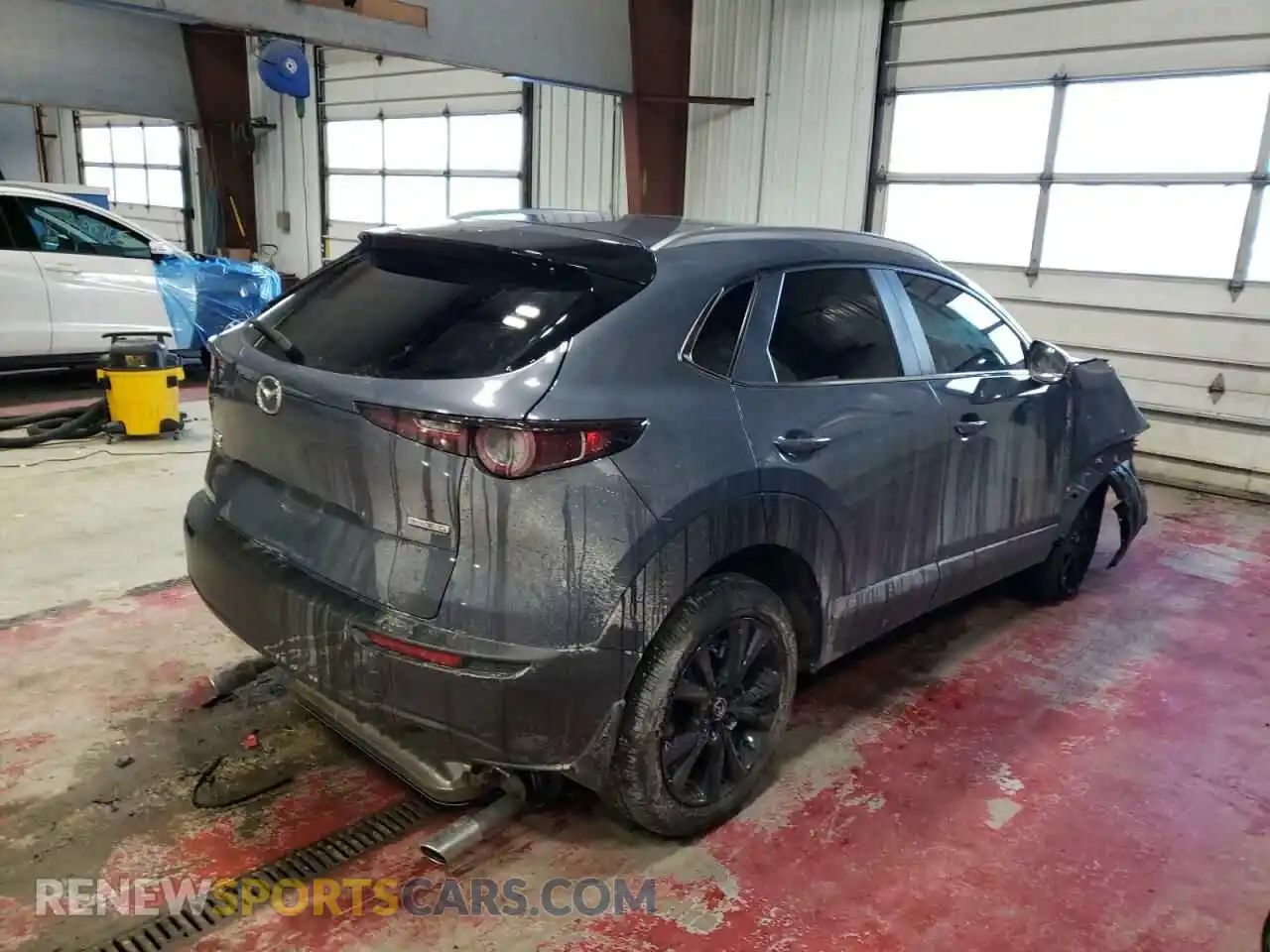 3 Photograph of a damaged car 3MVDMBCM1RM689426 MAZDA CX30 2024