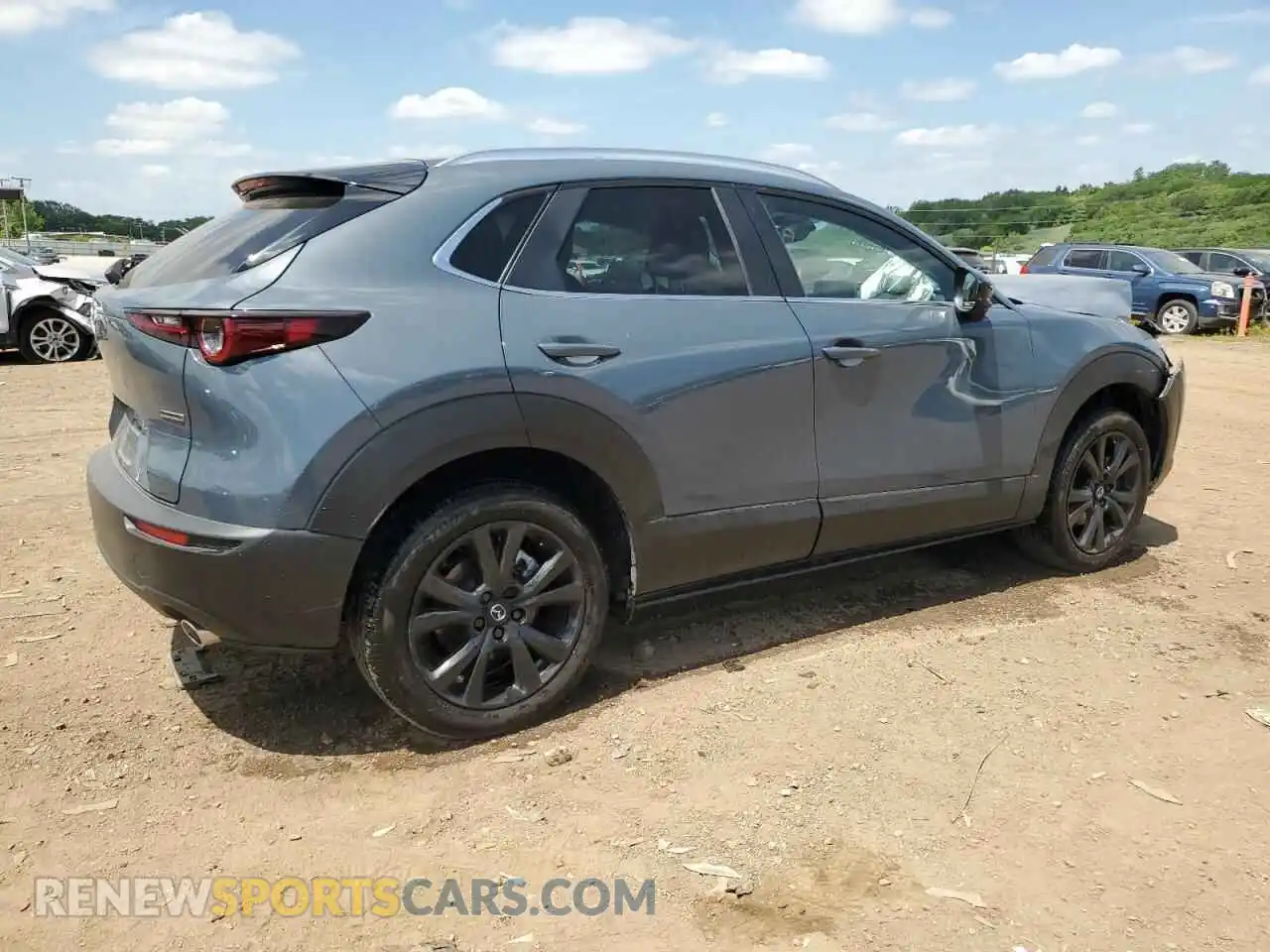 3 Photograph of a damaged car 3MVDMBCM2RM611852 MAZDA CX30 2024