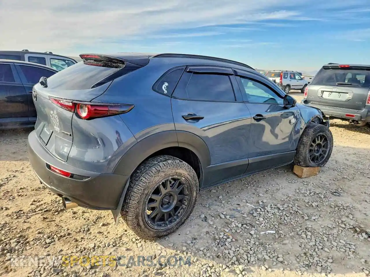 3 Photograph of a damaged car 3MVDMBCM3RM603470 MAZDA CX30 2024