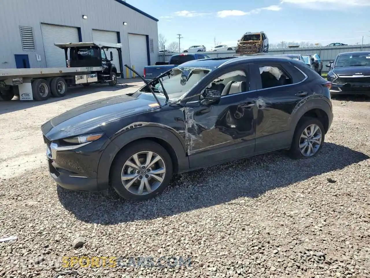 1 Photograph of a damaged car 3MVDMBCM3RM617093 MAZDA CX30 2024