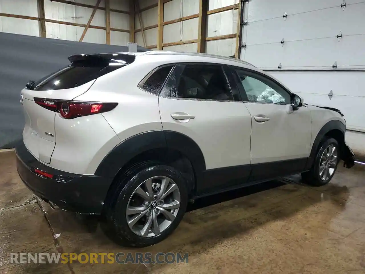 3 Photograph of a damaged car 3MVDMBCM3RM650174 MAZDA CX30 2024