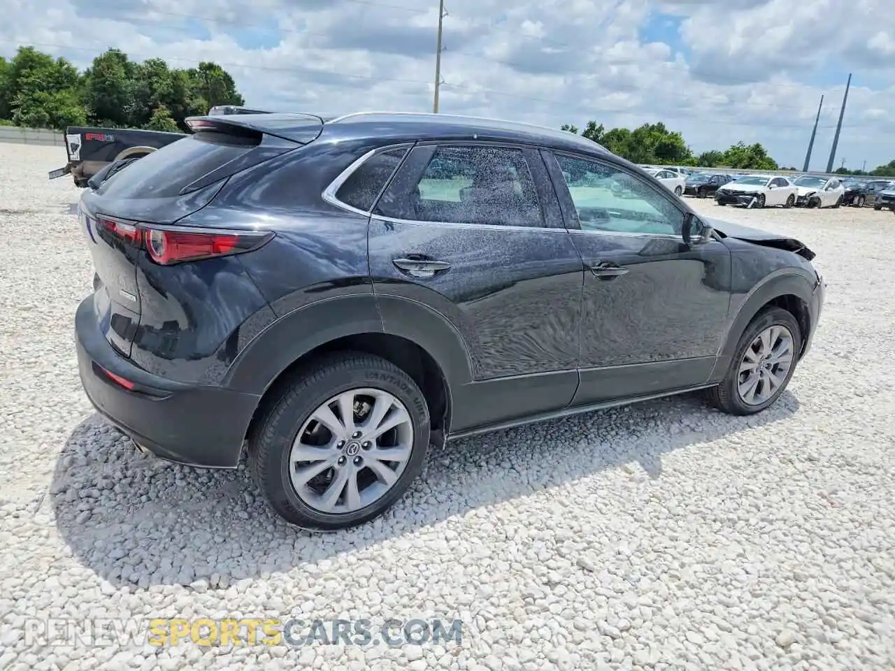 3 Photograph of a damaged car 3MVDMBCM3RM650384 MAZDA CX30 2024