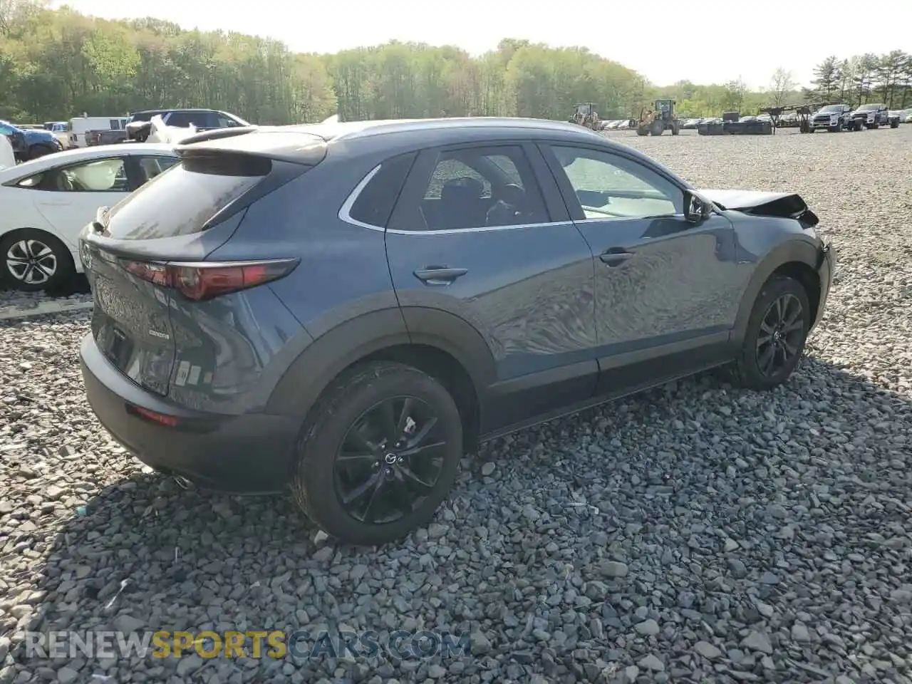 3 Photograph of a damaged car 3MVDMBCM5RM679031 MAZDA CX30 2024