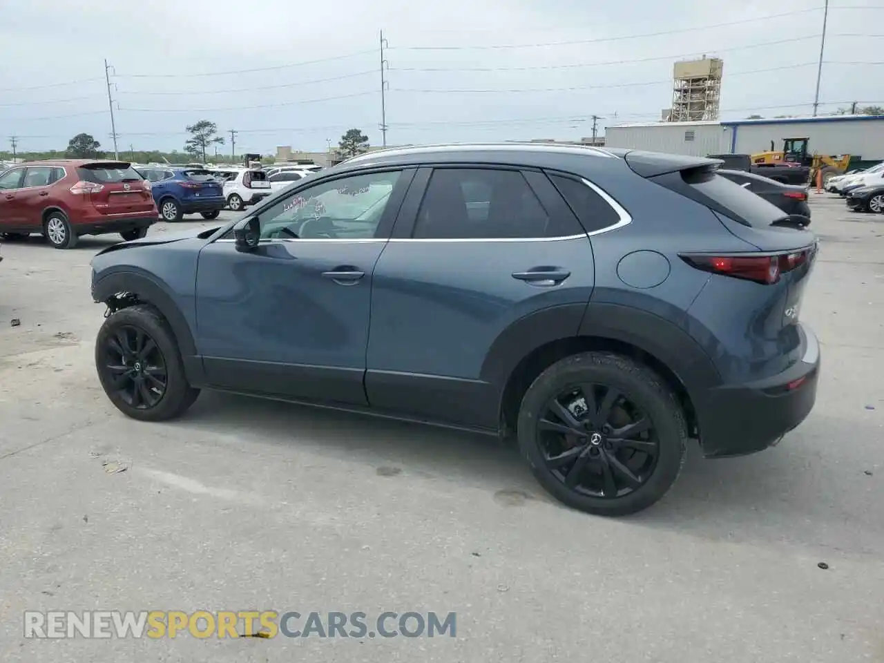 2 fotografías del automóvil dañado 3MVDMBCM8RM655872 MAZDA CX30 2024
