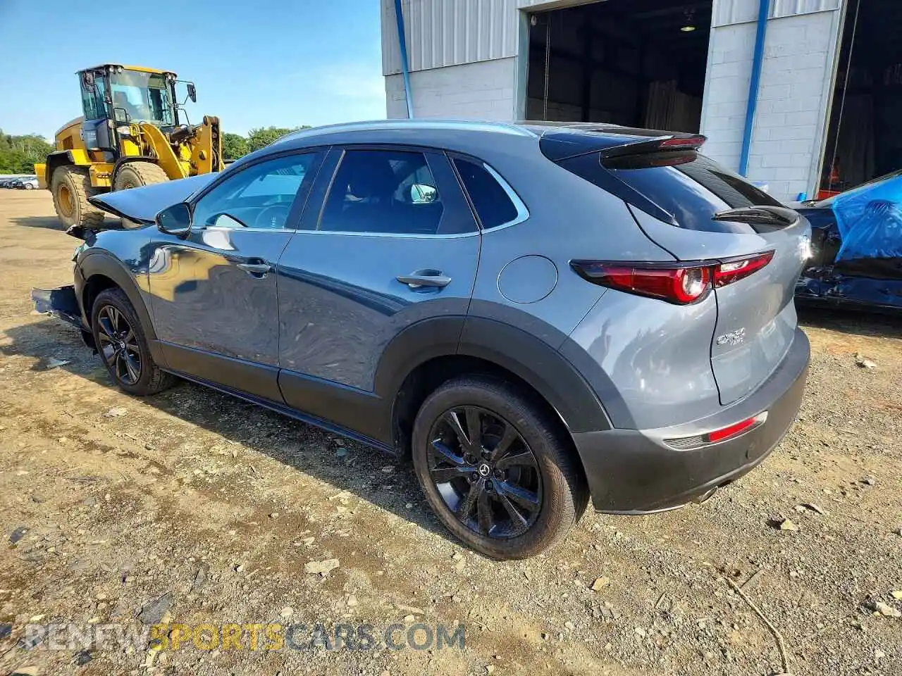 2 fotografías del automóvil dañado 3MVDMBCMXRM628298 MAZDA CX30 2024