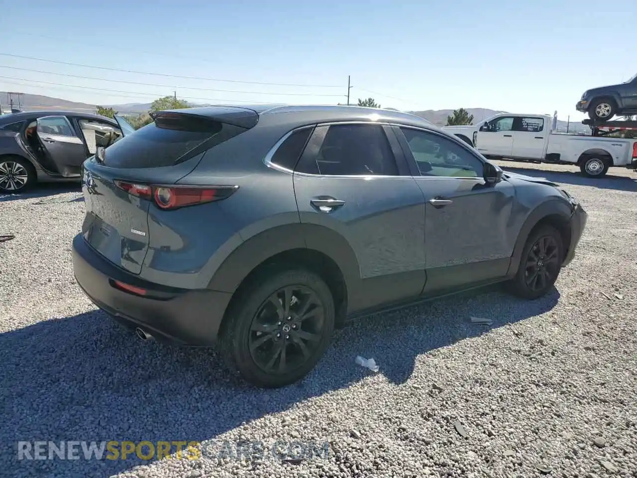 3 Photograph of a damaged car 3MVDMBCMXRM665819 MAZDA CX30 2024