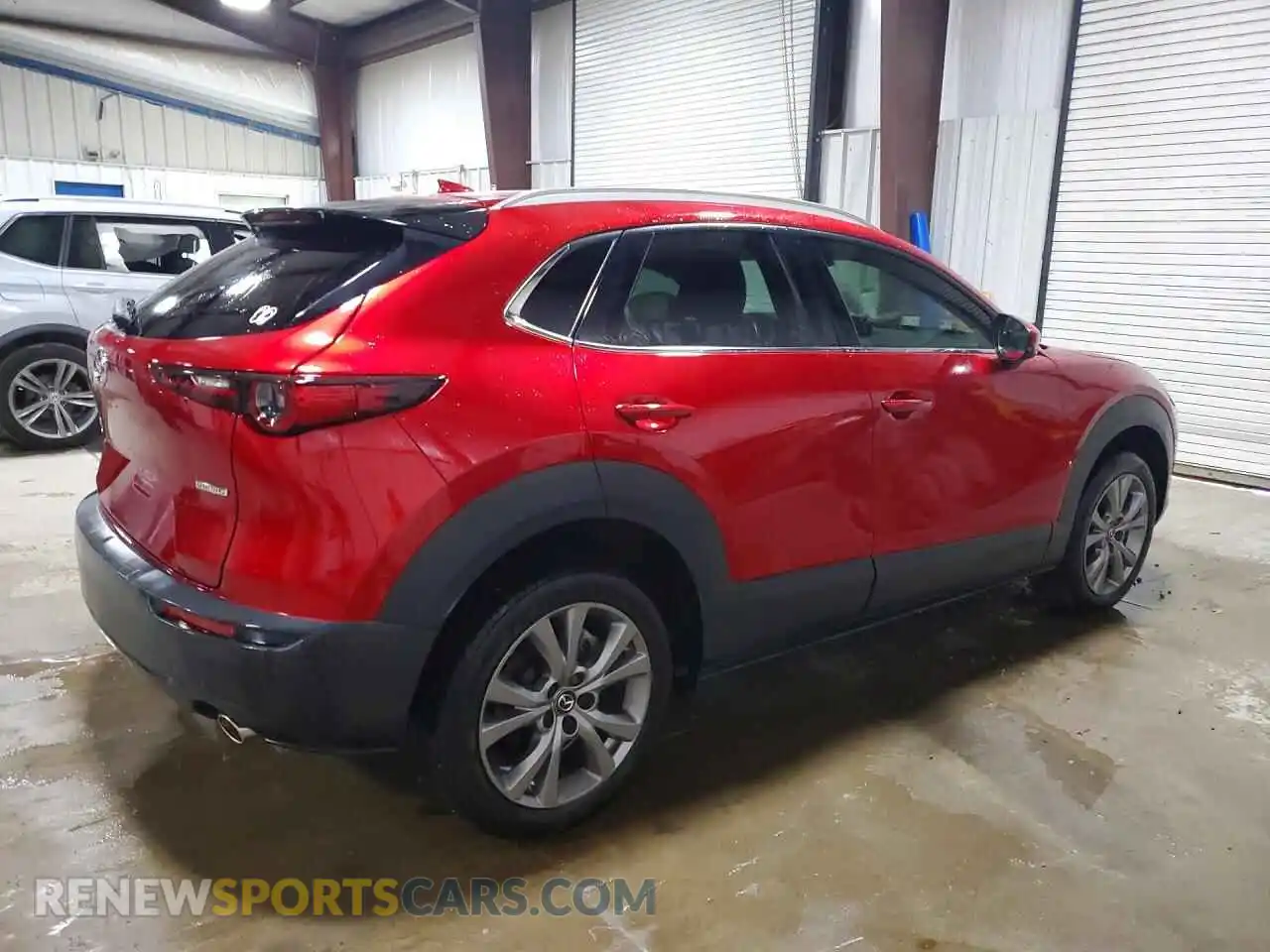 3 Photograph of a damaged car 3MVDMBDM4RM632586 MAZDA CX30 2024