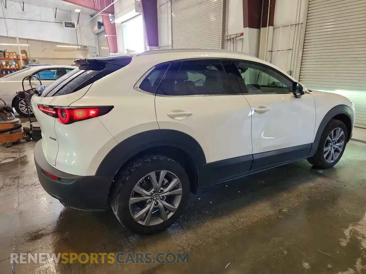 3 Photograph of a damaged car 3MVDMBDM5RM709708 MAZDA CX30 2024