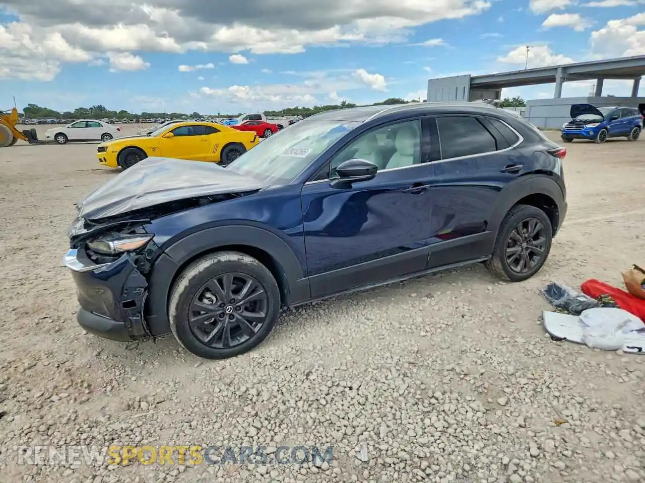 1 Photograph of a damaged car 3MVDMBDY1RM615019 MAZDA CX30 2024