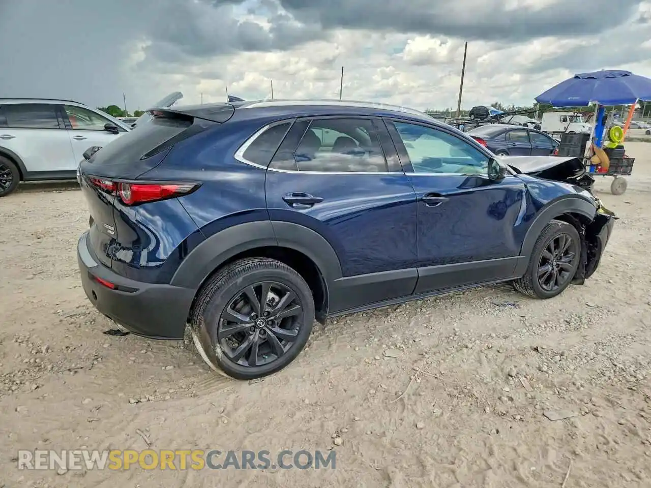 3 Photograph of a damaged car 3MVDMBDY1RM615019 MAZDA CX30 2024