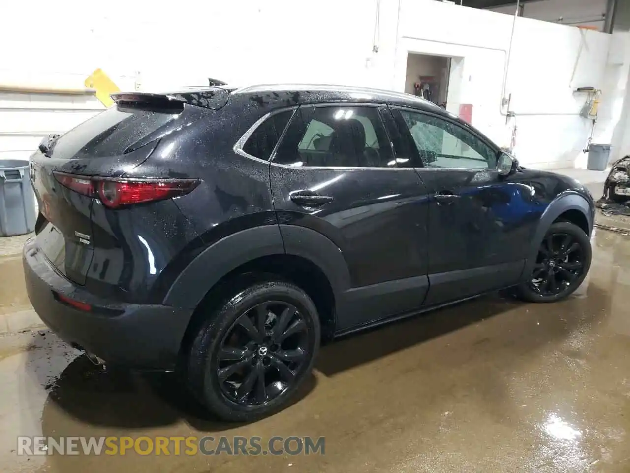 3 Photograph of a damaged car 3MVDMBDY3RM662651 MAZDA CX30 2024