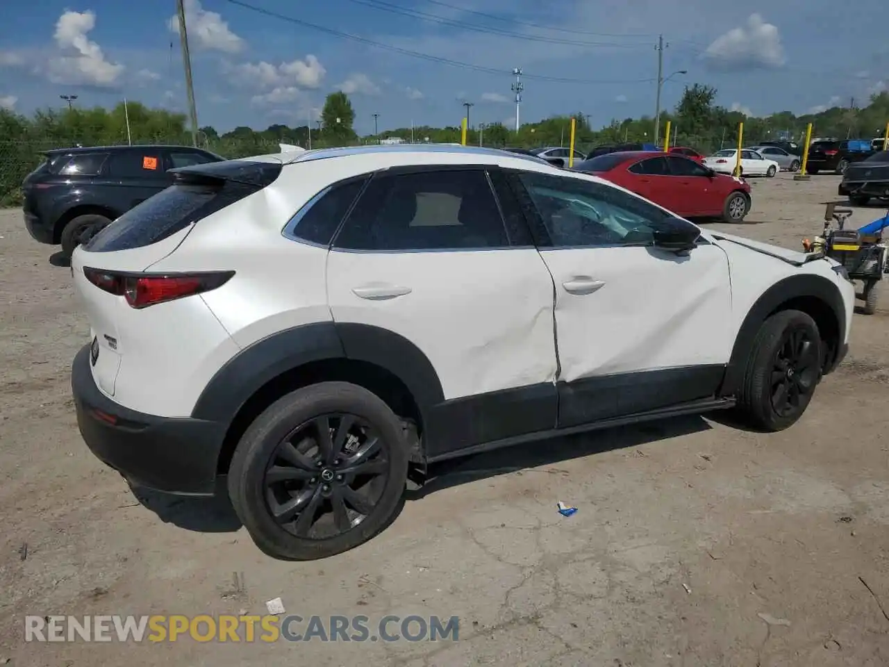 3 Photograph of a damaged car 3MVDMBDY7RM624677 MAZDA CX30 2024