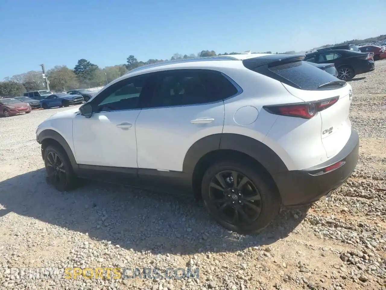 2 fotografías del automóvil dañado 3MVDMBEY0RM690146 MAZDA CX30 2024