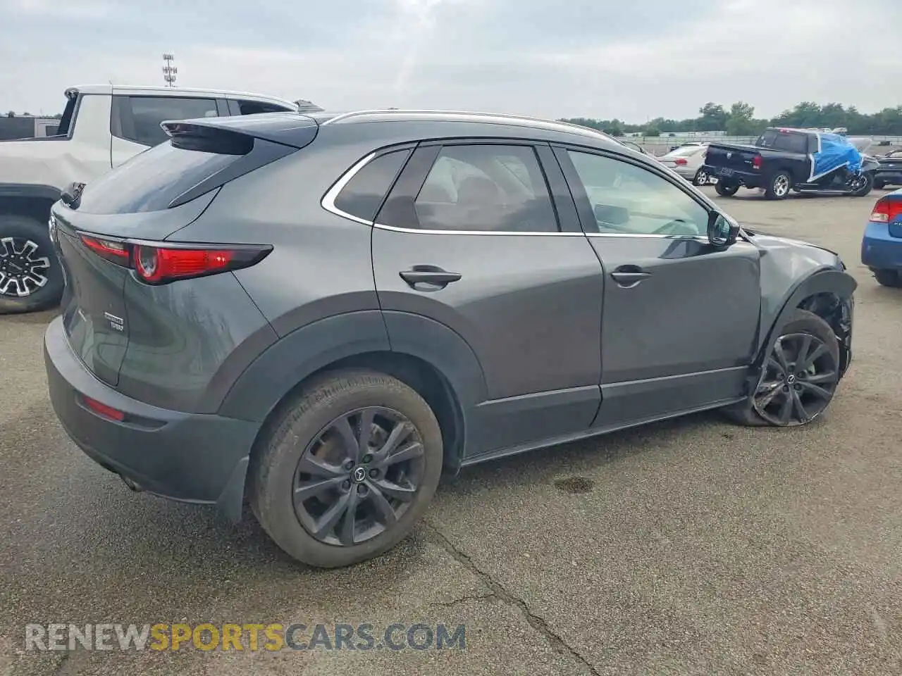 3 Photograph of a damaged car 3MVDMBEY3RM618969 MAZDA CX30 2024