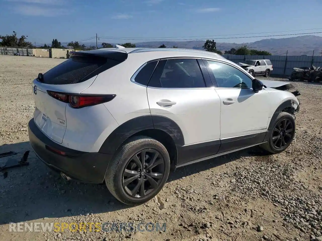 3 Photograph of a damaged car 3MVDMBEY3RM690559 MAZDA CX30 2024