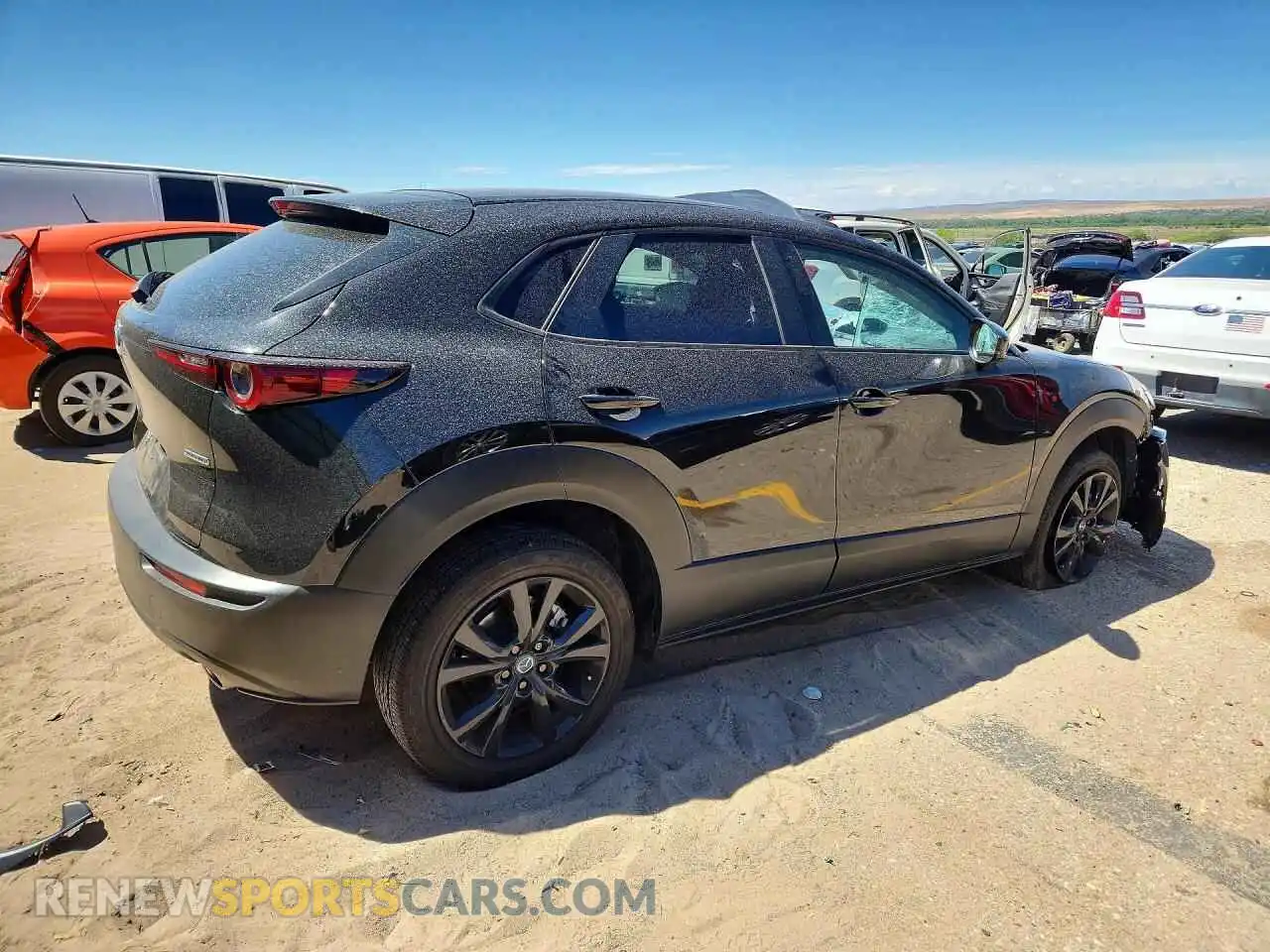 3 Photograph of a damaged car 3MVDMBBL0TM144138 MAZDA CX30 2026