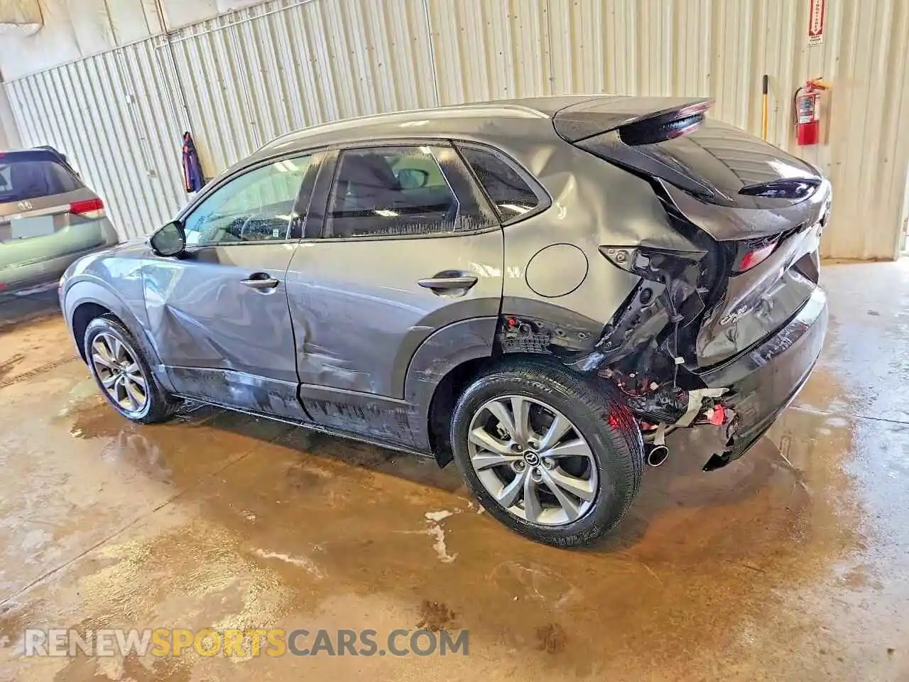 2 fotografías del automóvil dañado 3MVDMBCL0TM120744 MAZDA CX30 2026