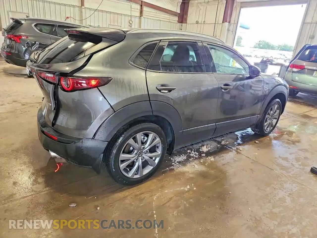 3 fotografías del automóvil dañado 3MVDMBCL0TM120744 MAZDA CX30 2026