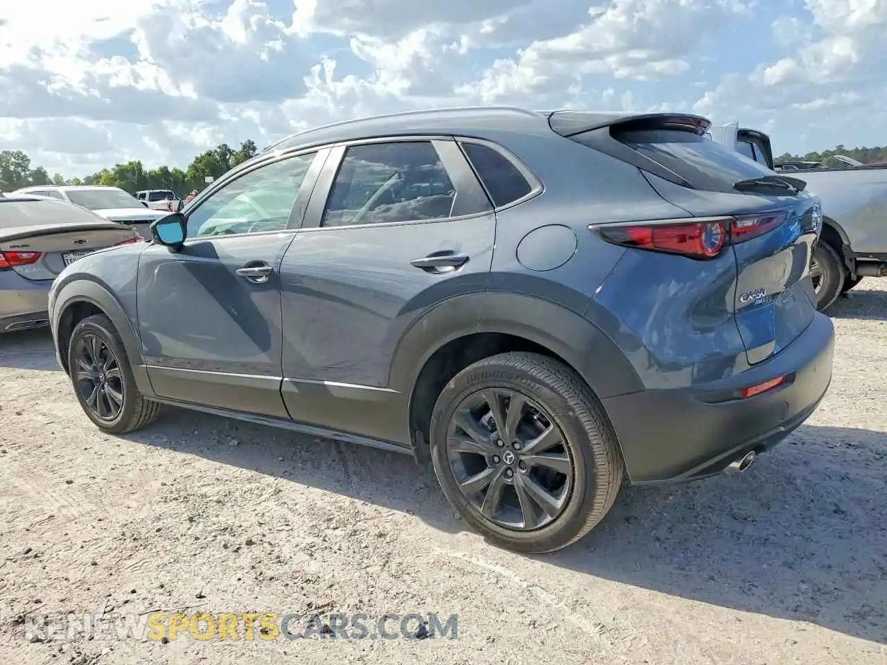 2 fotografías del automóvil dañado 3MVDMBCL0TM140010 MAZDA CX30 2026