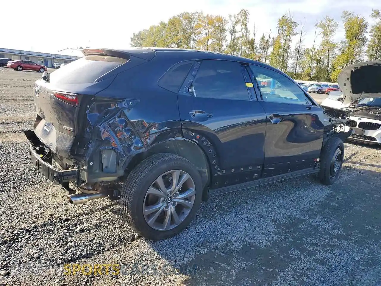 3 Фотография поврежденного автомобиля 3MVDMBCL1TM210467 MAZDA CX30 2026
