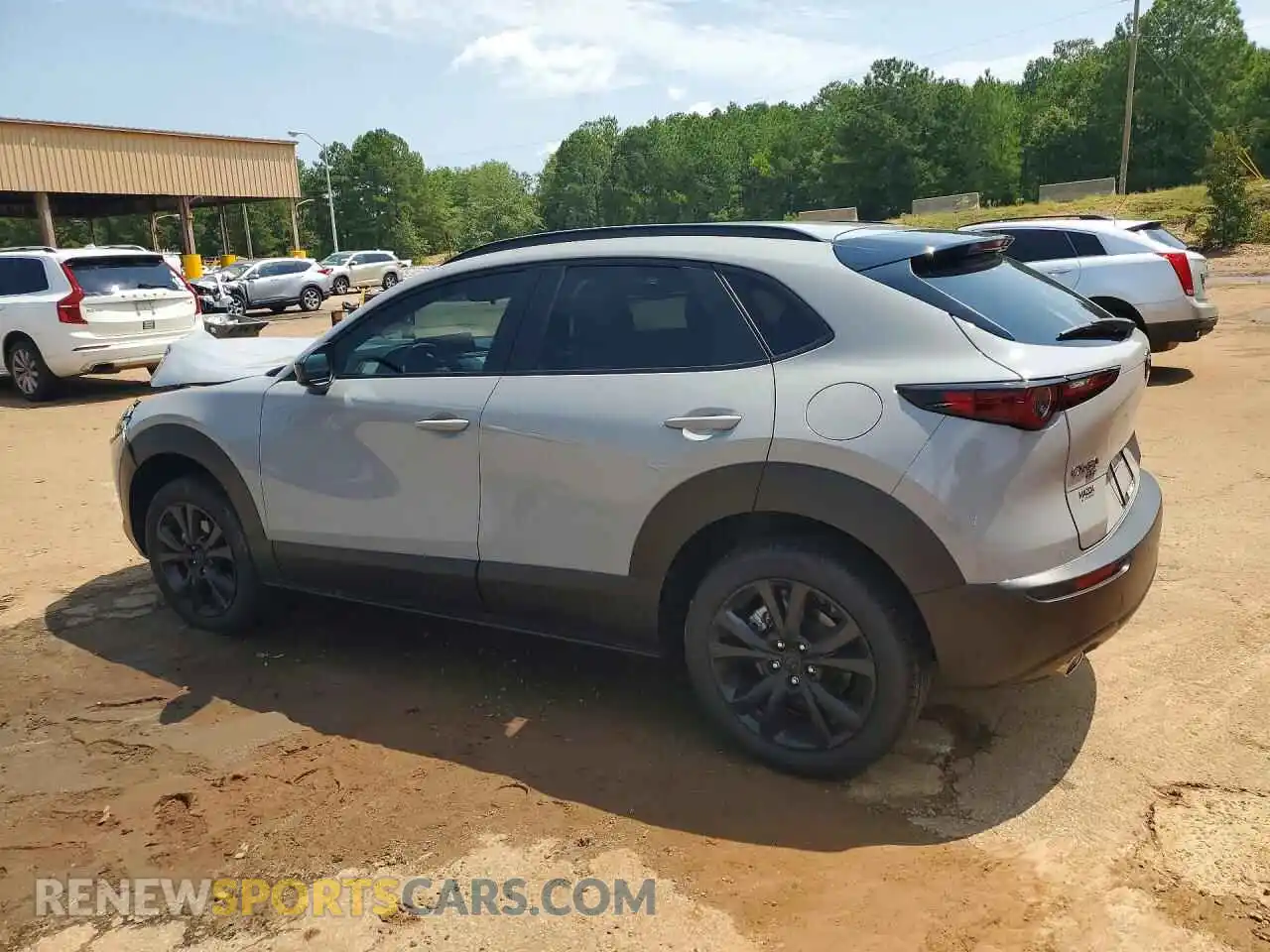 2 fotografías del automóvil dañado 3MVDMBXL4TM138092 MAZDA CX30 2026