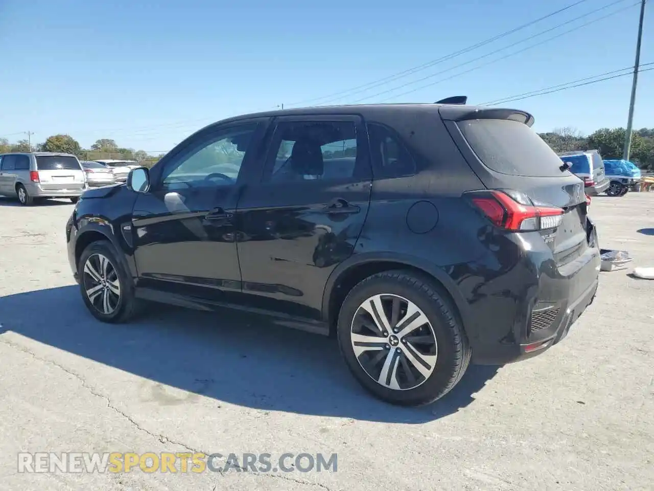 2 fotografías del automóvil dañado JA4APUAU9MU001133 MITSUBISHI OUTLANDER 2021
